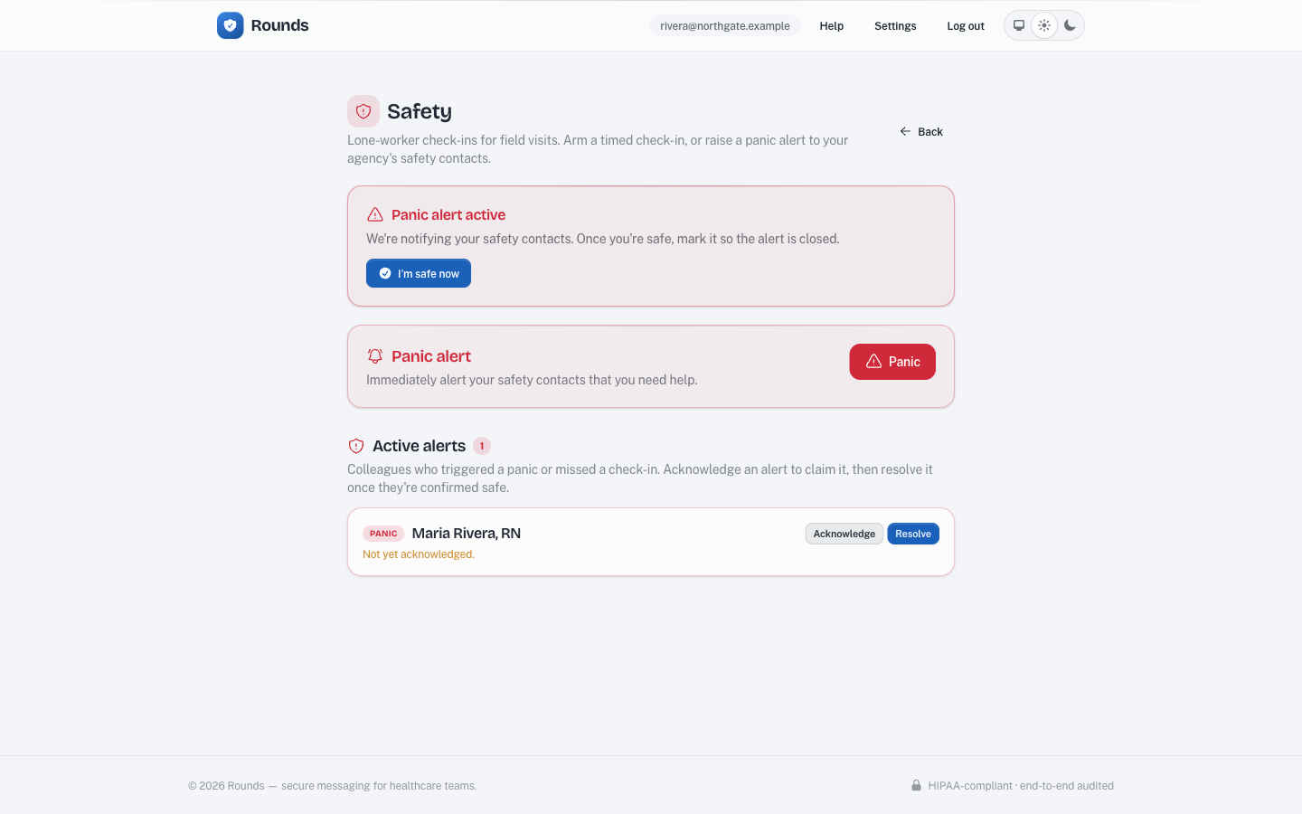 The Active alerts section of the Rounds Safety page, listing a colleague's alert with Acknowledge and Resolve controls.